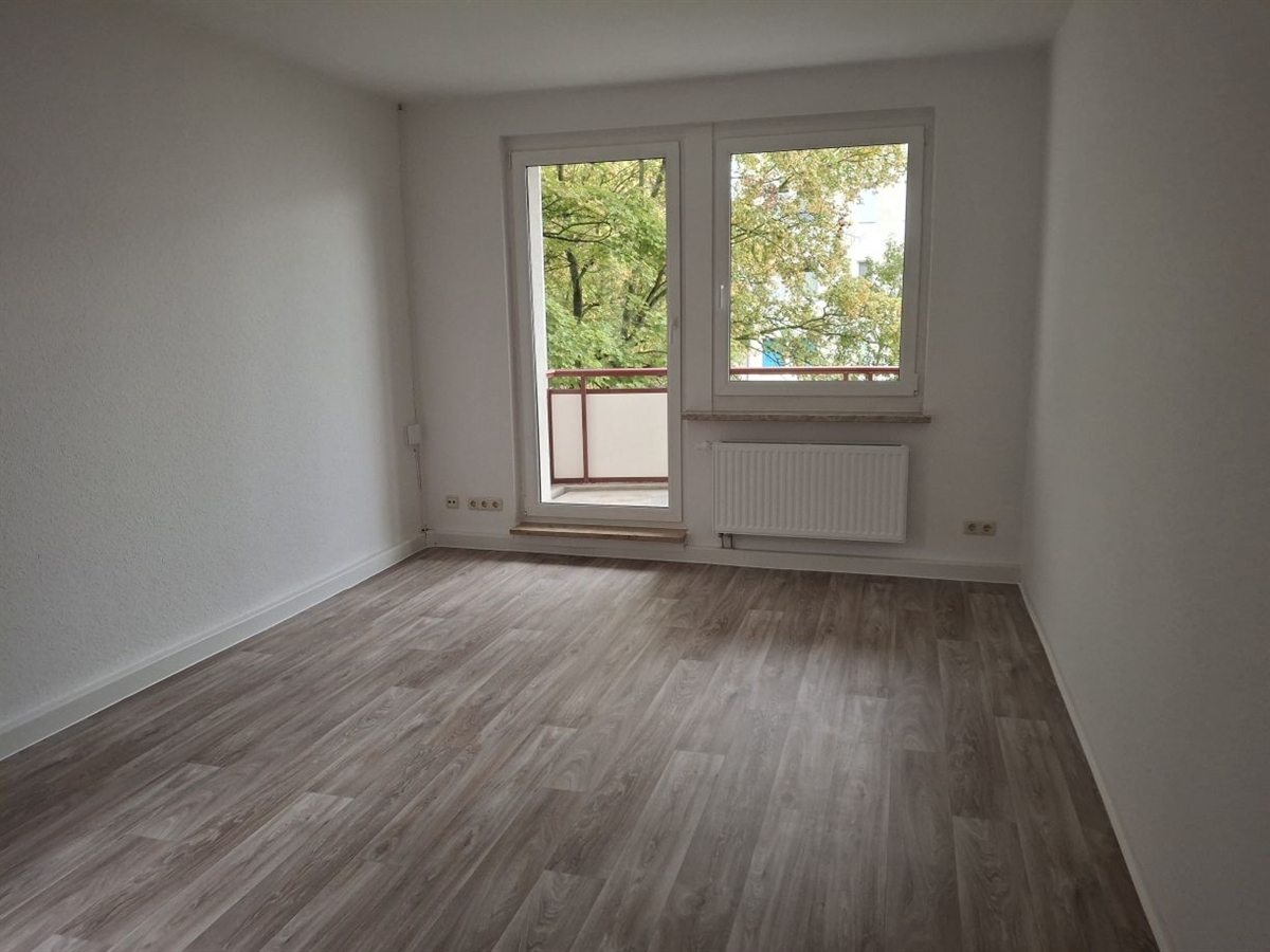 Schöne 2-Raum-Wohnung mit Einbauküche im Grünen - Foto 4